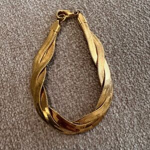 Avon Gold toned braided Bracelet